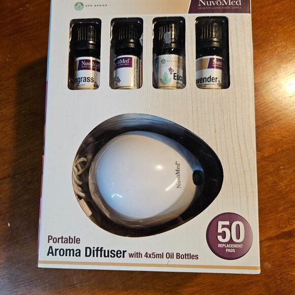 New one NUVOMED PORTABLE AROMA DIFFUSER W/ 4 X 5ml OIL BOTTLES included - Picture 1 of 6